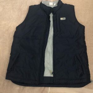 Sideout vest is dark blue with gray